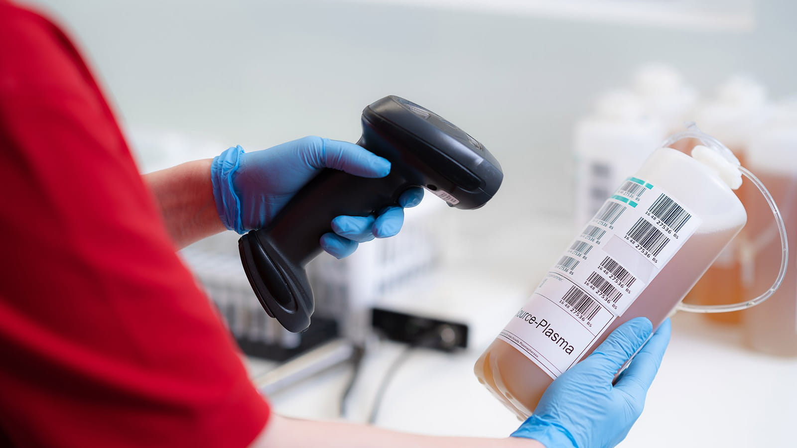 employee scanning bottle